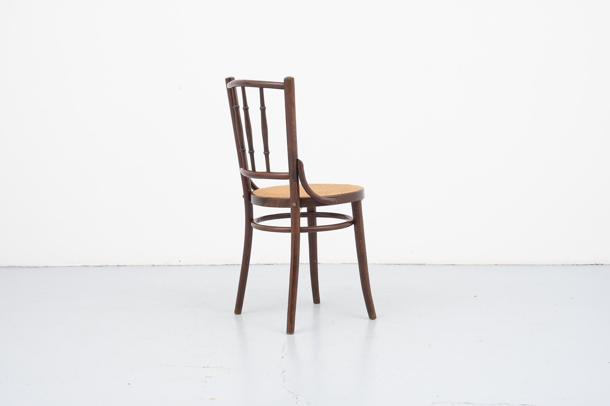 Wood and caning bistro chair
