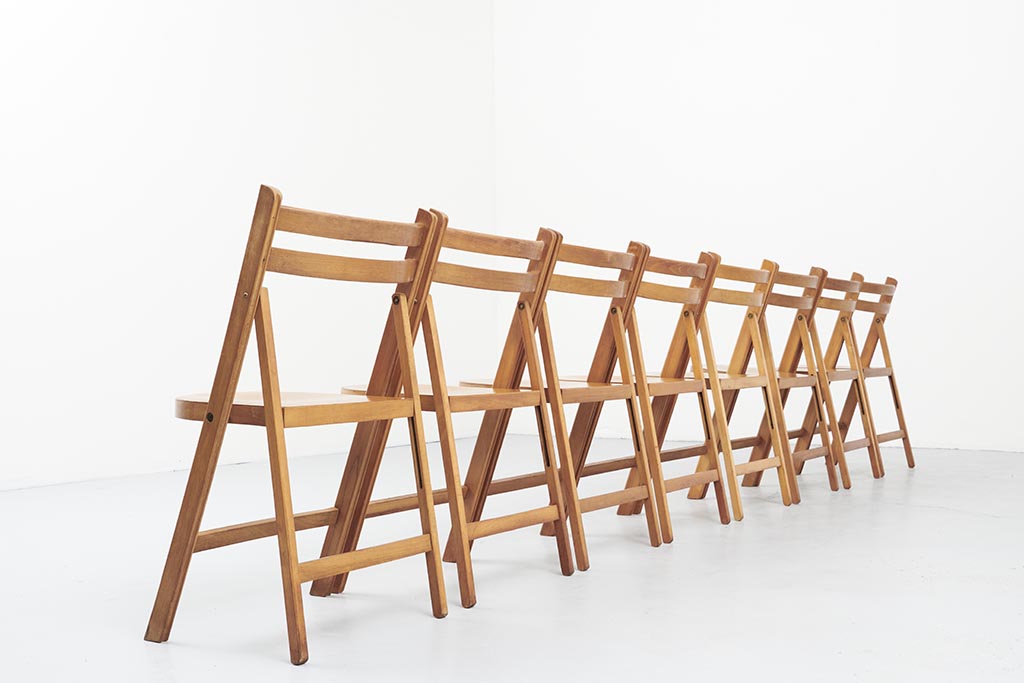 Vintage folding wooden chair with half-moon seat