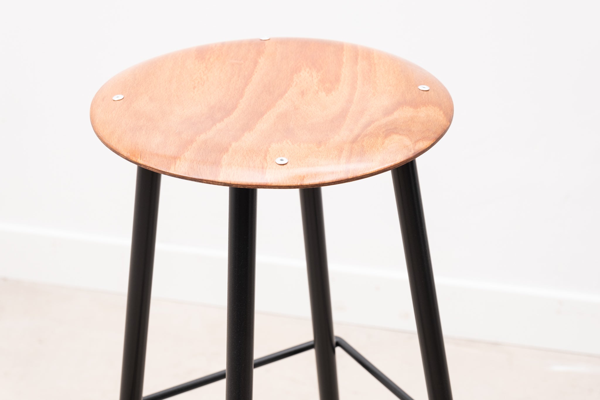 Bar stool with thin metal legs