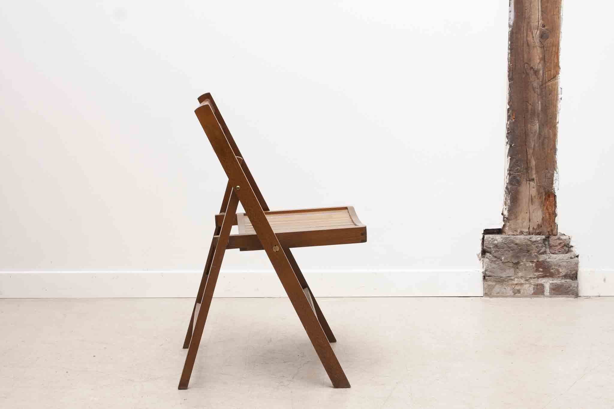 Vintage folding wooden chair with half-moon seat