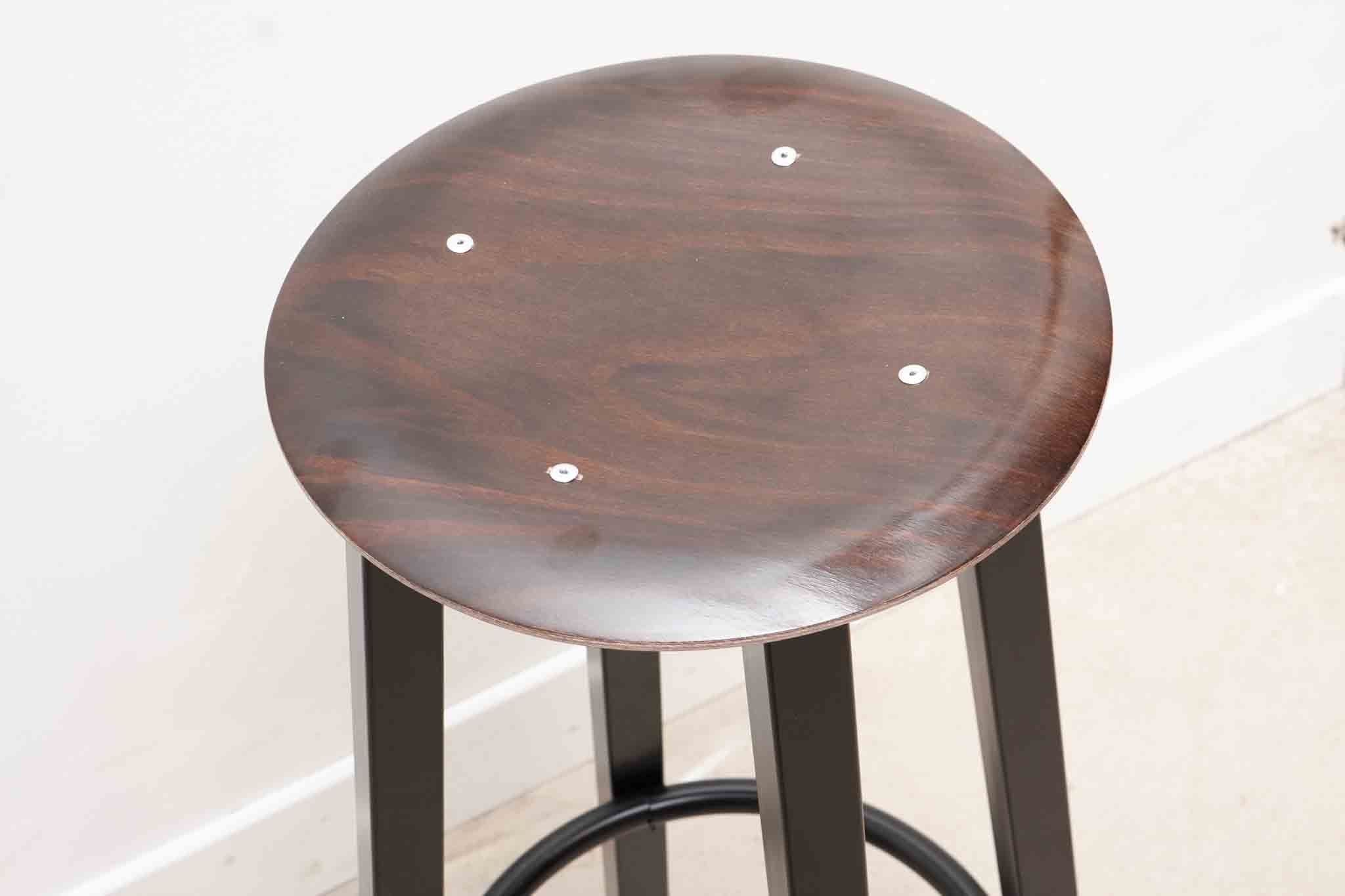 Vintage black metal and wood bar stool