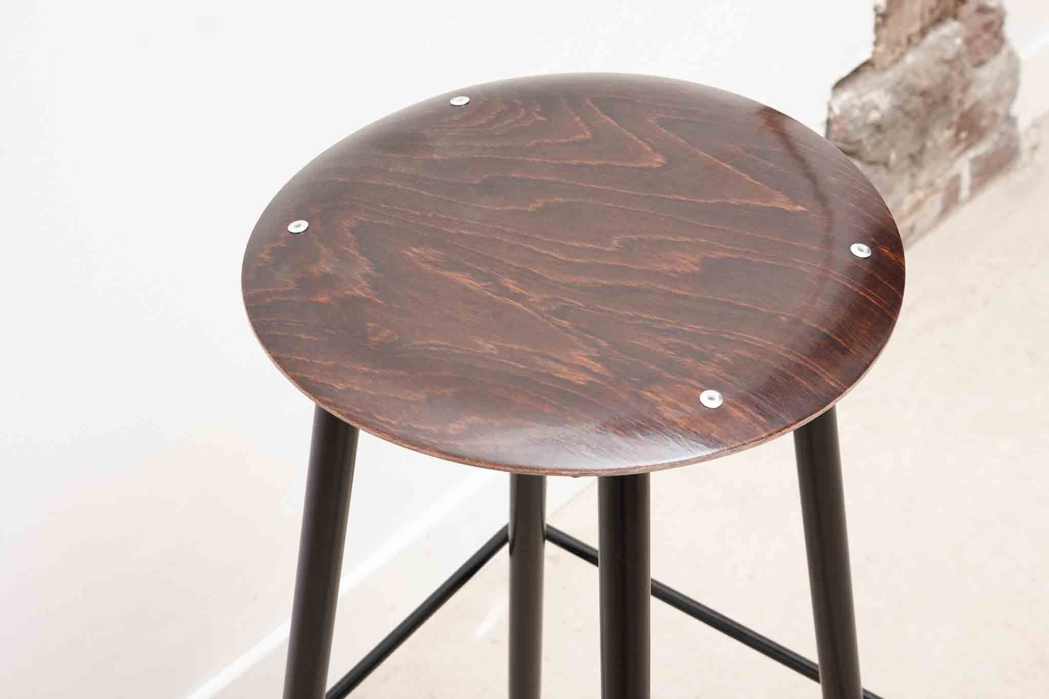 Bar stool with thin metal legs