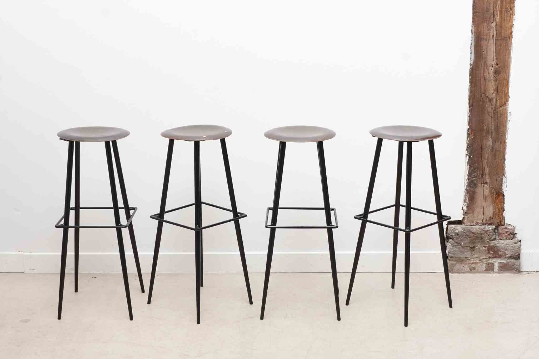 Bar stool with thin metal legs