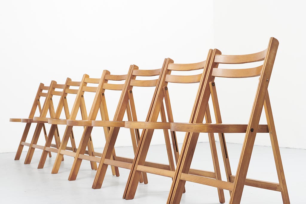 Vintage folding wooden chair with half-moon seat